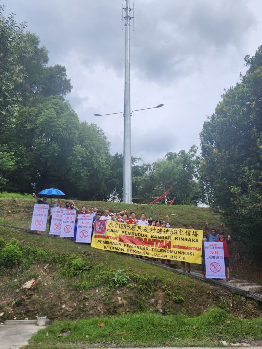 大都会/ME03头/赵启兴—花园居民投欣电讯塔建得太靠近民宅/8图