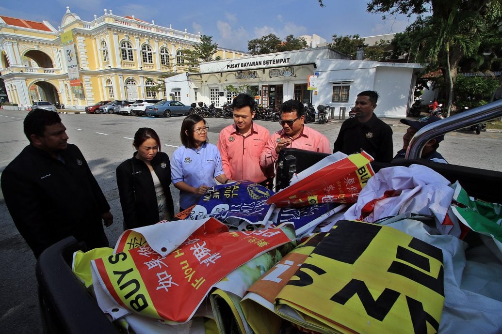 封面副文(大北马)陈淑湘:取消电话号码 对付非法广告牌商家
