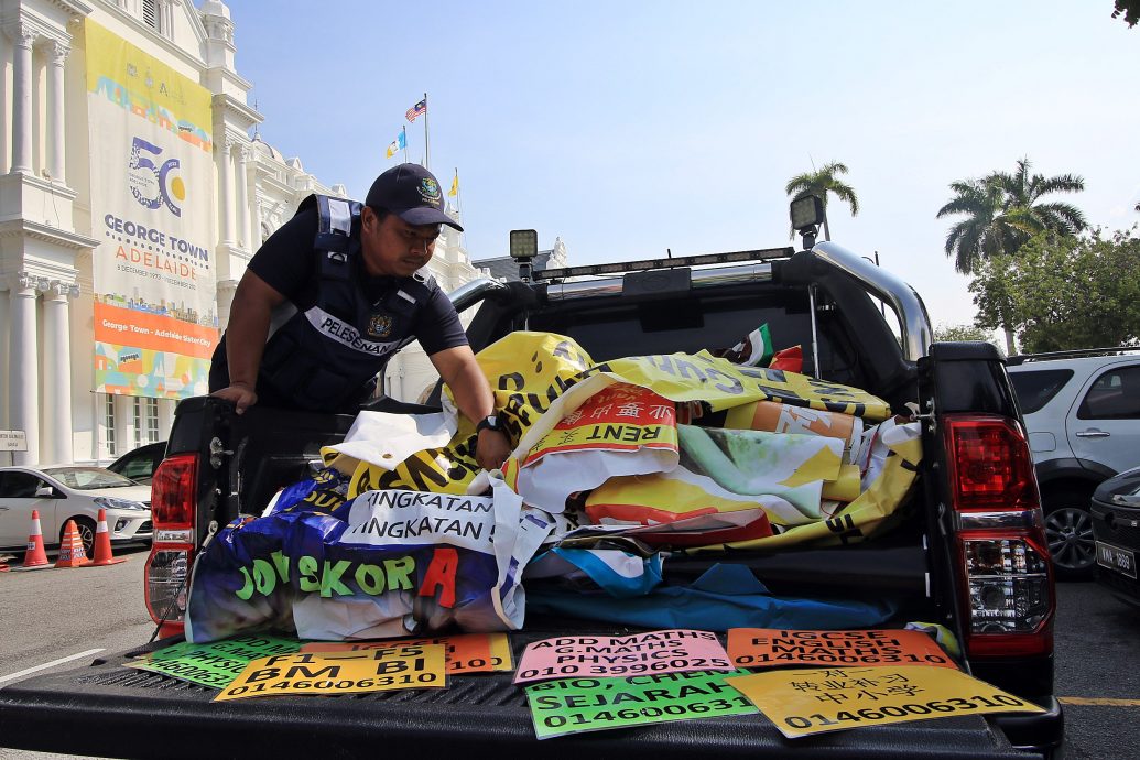 封面副文(大北马)陈淑湘:取消电话号码 对付非法广告牌商家