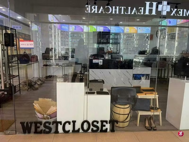 *已签发*柔:狮城二三事:代售逾45万令吉名牌包 狮城女董事涉私吞被控