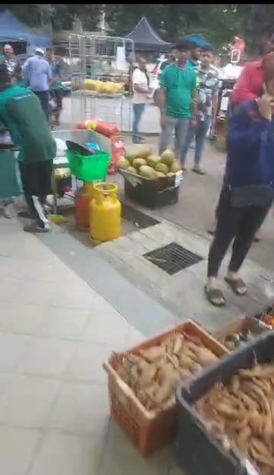 请签发-大都会13/新张迷你超市涉走廊宰鸡鱼,移民局扫荡扣逾60名外劳/4图