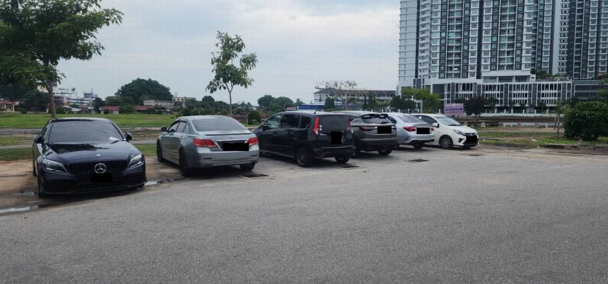 (古城第三版主文)拉真达花园“停车陷阱”