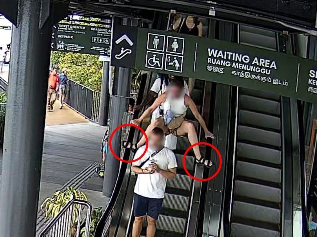 (大北马)背心男竟脚踩扶手梯下楼 危险行径被拍个正着