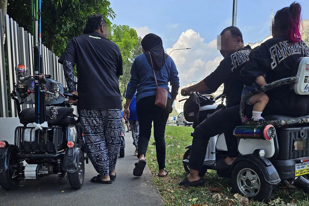 (已签发)柔:狮城二三事:公寓外提醒个人代步工具骑士减速 女会计遭数人围殴