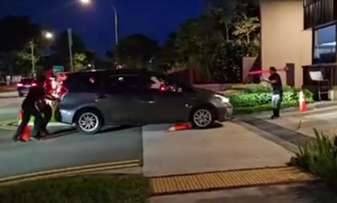 (已签发)柔:狮城二三事:私召车司机被指 不顾保安阻挡倒车