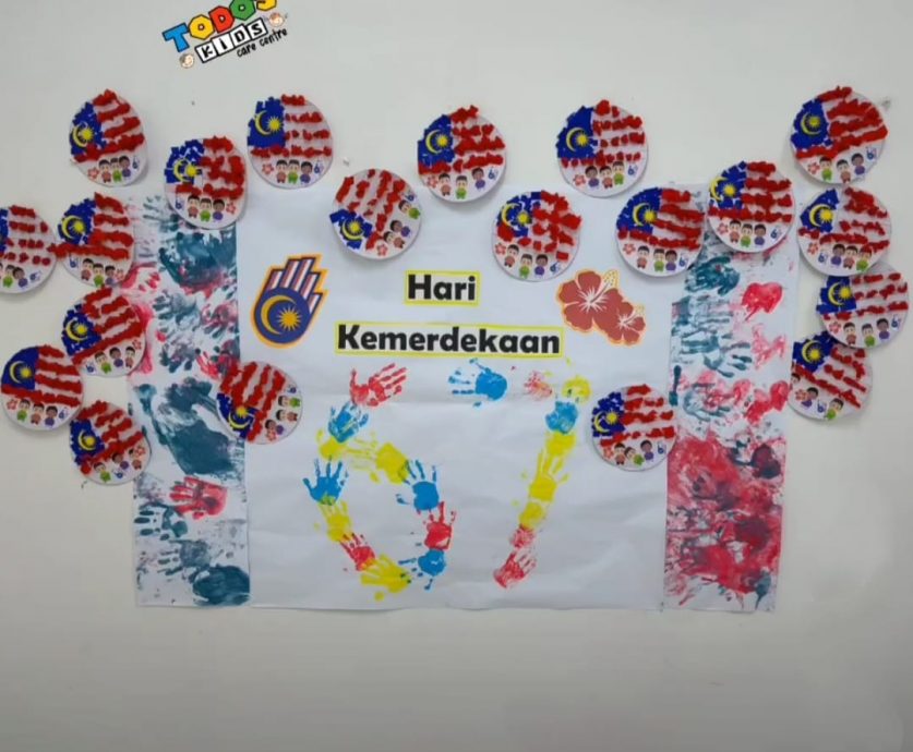 无论身在何处仍心系大马,挥动辉煌条纹祝福国家