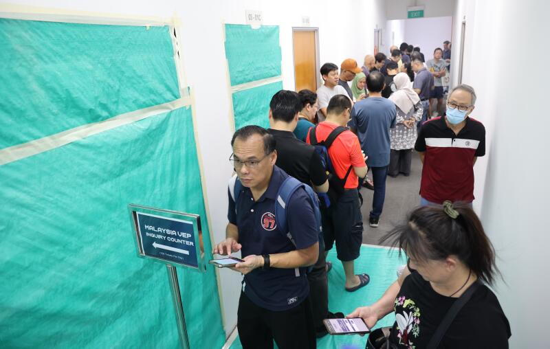 *已签发*柔:狮城二三事:大马VEP信息中心 100个号码40分钟派完