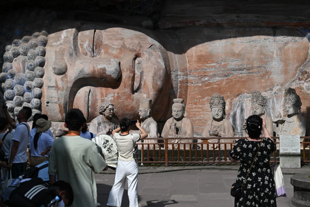 拼盘 《黑神话:悟空》重庆大足石刻取景地 看清千手观音有几只手