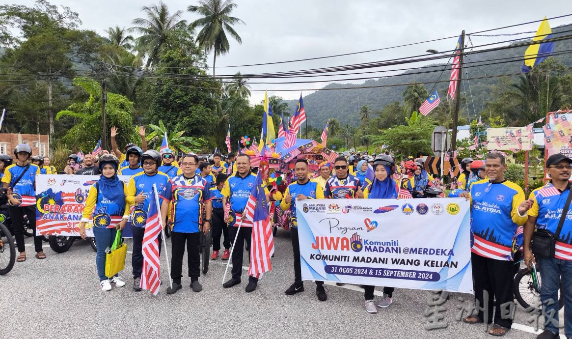 旺吉辇社区国庆日游行,全村老少倾巢展现爱国精神,游行至马泰关卡游客感受独立氛围