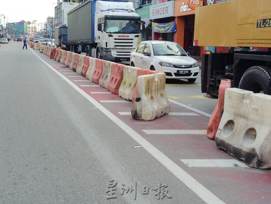 (已签发)柔:**封面**东甲麻坡路拟建分界堤重新规划 商家居民错愕
