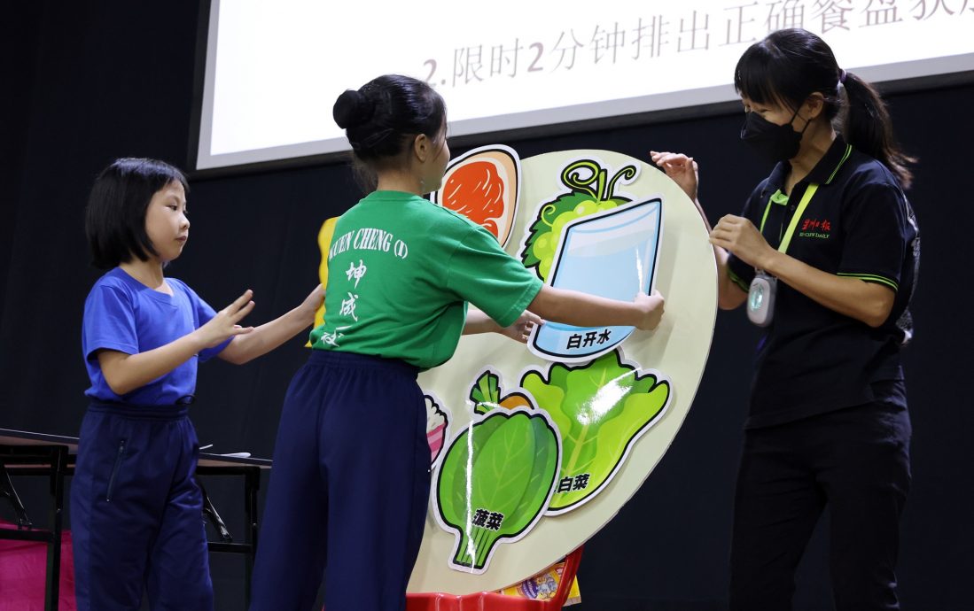 (版4头)本报活动/大都会/坤成一校 全国小学健康校园运动