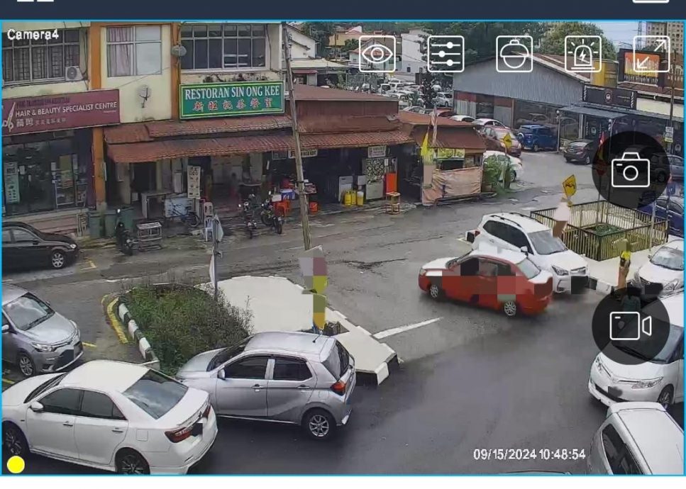大都会-为防违例停车,路段设安全岛+派月饼