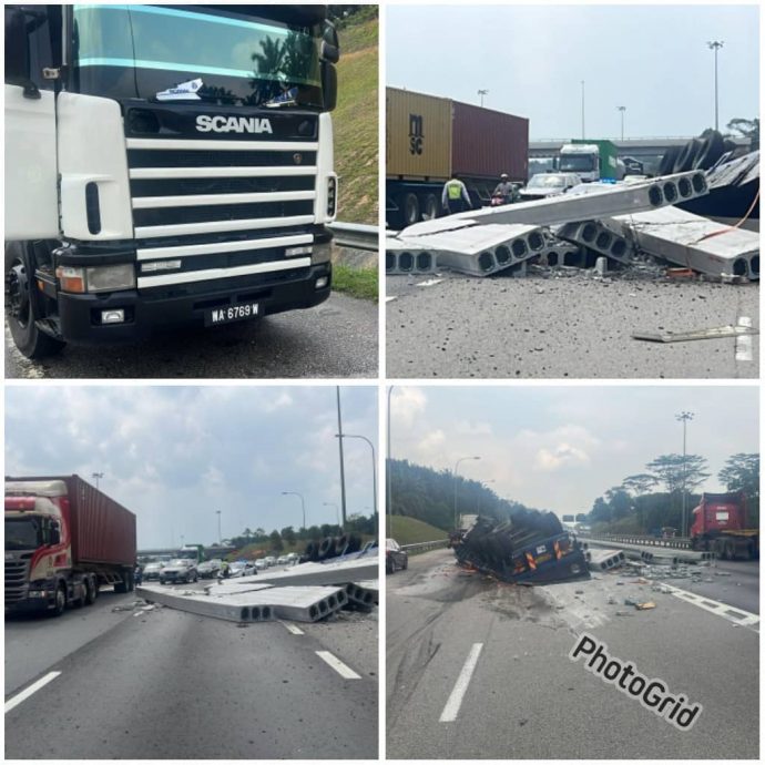 *已签发* 柔:拖格罗里尾部脱落翻覆 混凝土石柱散落南北大道 幸无人伤亡