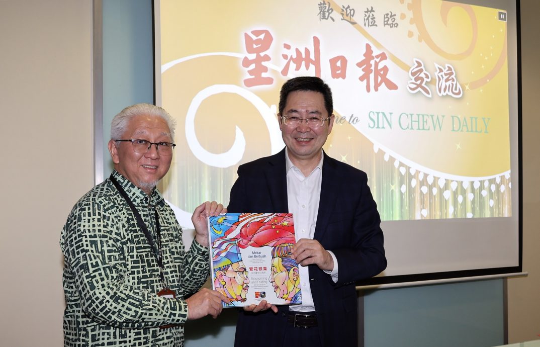 版头∕中国日报莅访星洲日报总社交流