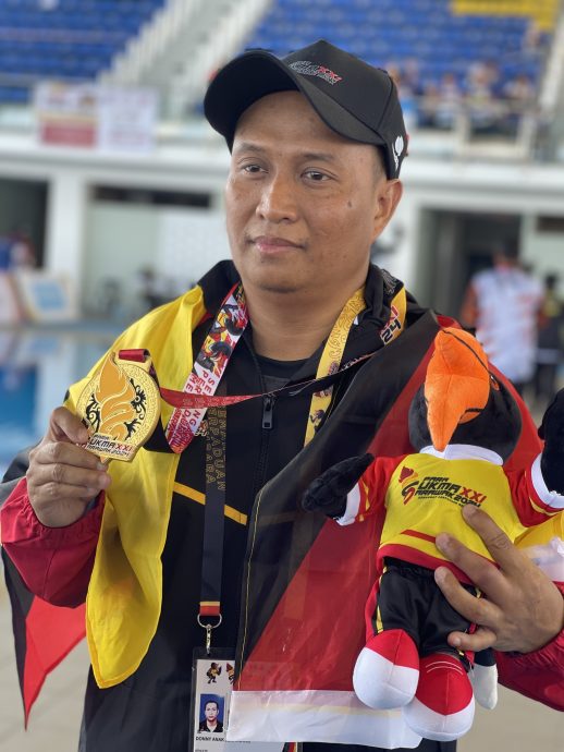 砂拉越大马残运会| 车祸失右臂自强不息 鲁斯典托游出新希望