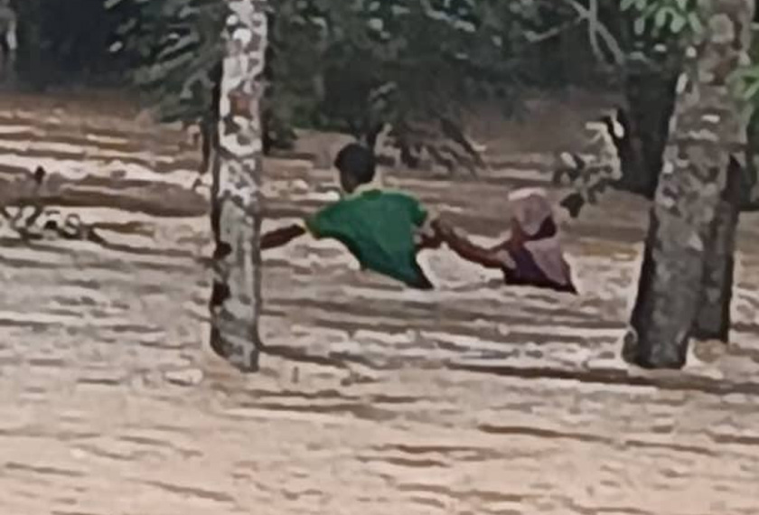 (全国版)吉北区昨晚2小时豪雨,一对母子涉水走捷径被急流冲走,下落不明。