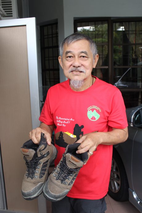 （共享稿，9月22日刊）有故事的人：享受爬山挑战和美景  李进生爬喜马拉雅山最难忘