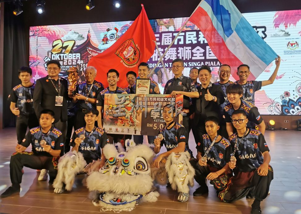 必下-大都会:第三届“万民和谐文化杯”高桩舞狮全国邀请赛,雪州万挠玄龙体育会狮队夺冠/8图