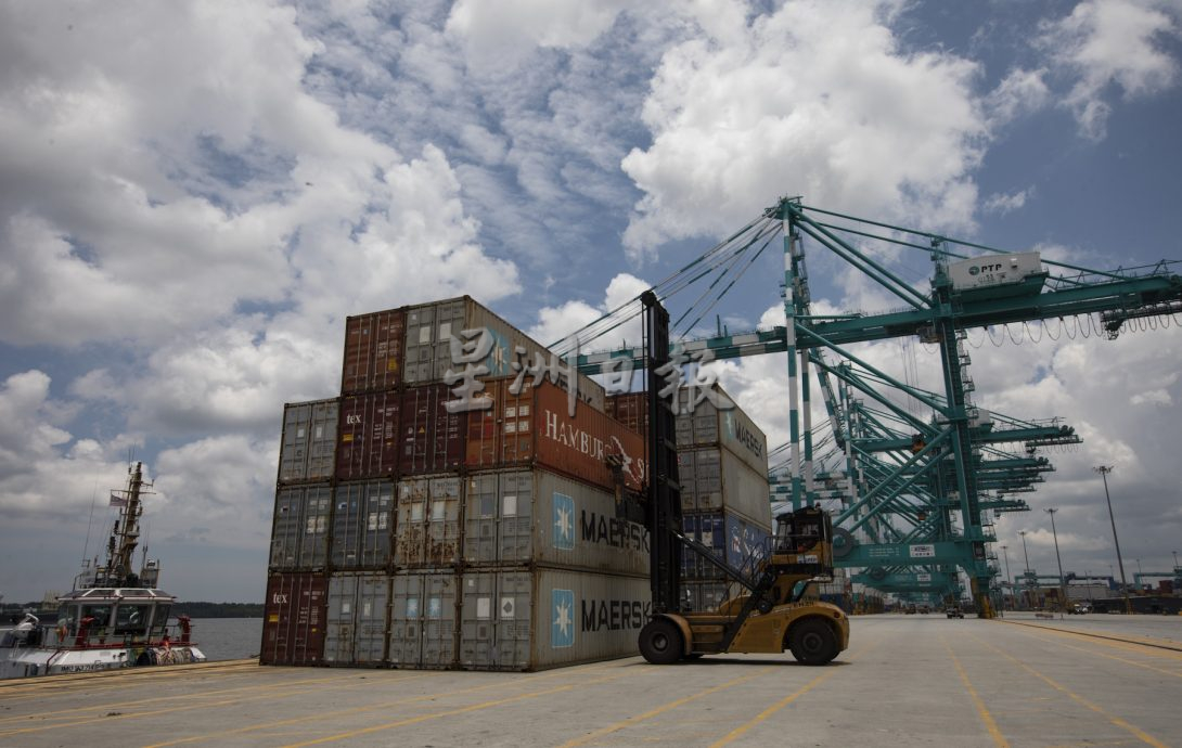 (3/10见报)星角摄/图说大马(10月3日刊):丹绒柏乐巴斯港口的数字化与自动化无人驾驶技术