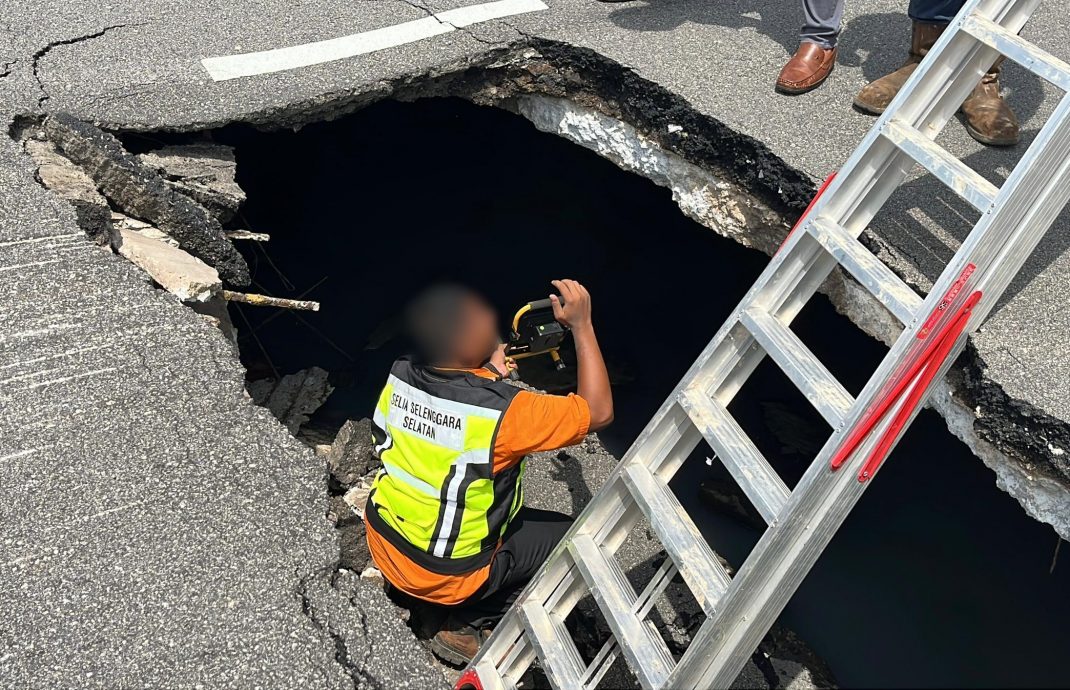 (古城封面主文)马路出现骇人大坑 工程局将封锁部分路段
