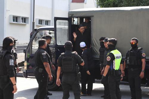 (补图)GISB首席执行员夫妇等22人被控有组织犯罪成员