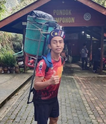 视频|为迎战60国超级越野精英 沙巴登山搬运工苦练了15年!