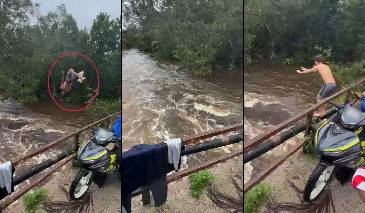 视频|雨后跳激流耍特技 2男被斥耍帅不要命！