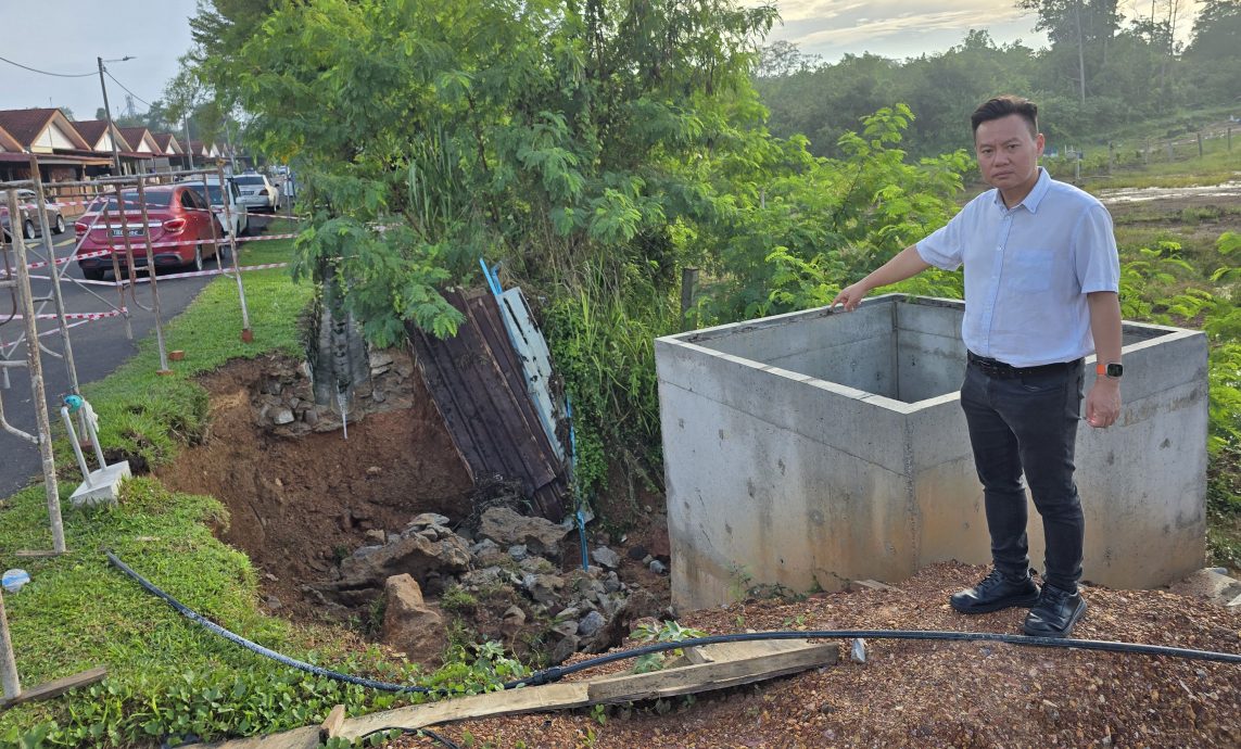 (古城第三版主文)豪雨造成住花园沟渠泥崩现大坑洞