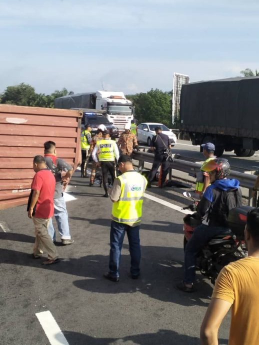 (已签发)全国:视频|集装箱车祸现场传出求救声 南北大道仍堵15公里