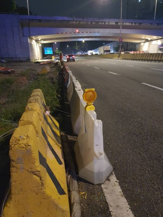 版头-大都会/余保凭与本报读者投诉古晋路道路危险问题/8图