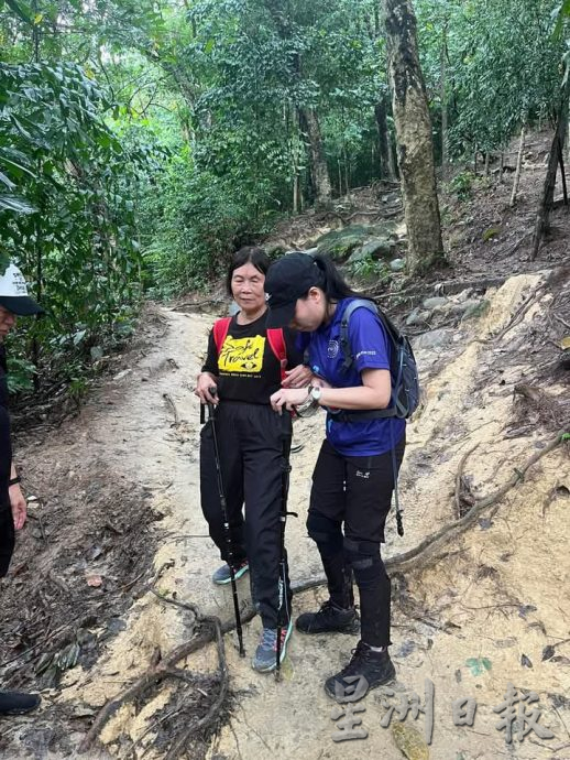 版头//大都会/Go Go Hiking带领视障人士登山，2小时完成3.9公里的登山挑战