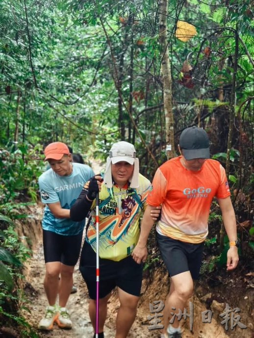 版头//大都会/Go Go Hiking带领视障人士登山，2小时完成3.9公里的登山挑战