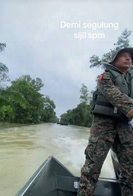 视频|考生乘船坐军车穿越水灾区 “我们只为了考SPM!”