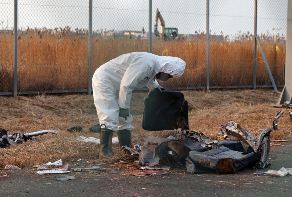 韩失事客机“黑箱”受损 解读至少需一个月