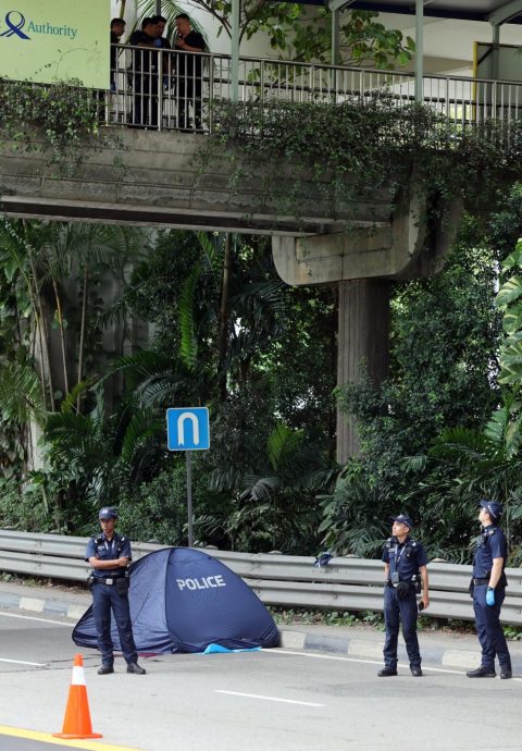(已签发)柔:狮城二三事:男子疑从行人天桥坠亡 现场留下一行李箱