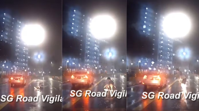 *已签发*柔:狮城二三事:狮城怪男夜躺路中央淋雨 险遭轿车碾过丢命