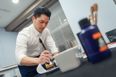 蒋万安亲写“蛇马龙鹤”春联  这字超难写