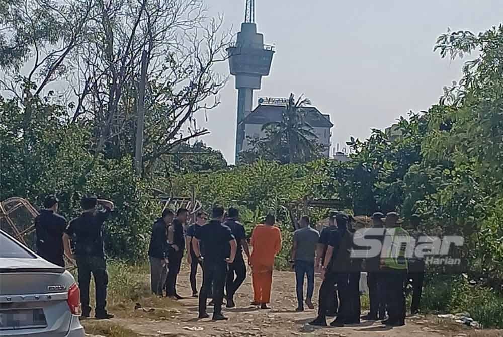 全国:关丹女电商谋杀案,嫌犯被带往案发地点。