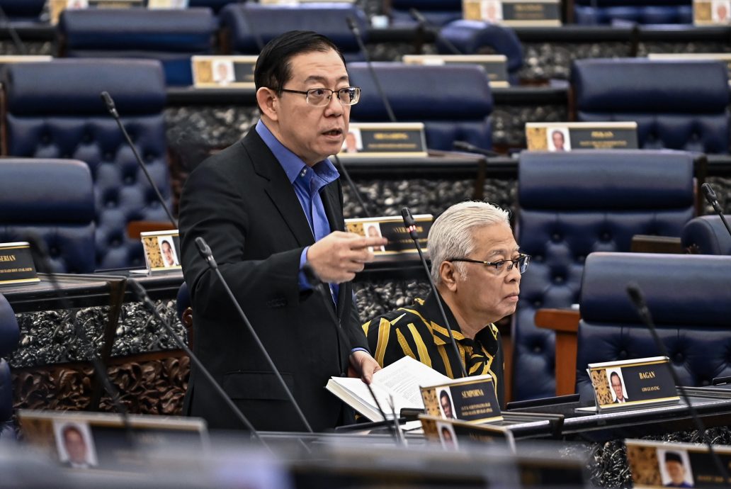 国会/ 林冠英促伊党议员撤言论道歉. 反种族歧视法扯上513种族骚乱