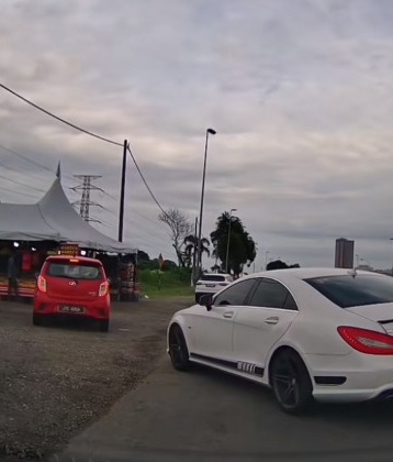 视频|马赛地危险变道险酿祸 网调侃:逼Axia司机买水果?