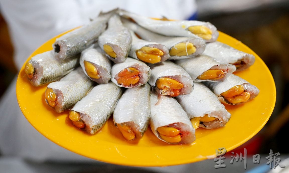 霹:巴刹职人/26日见报/封底主文/怡保狮尾巴刹鱼贩姐弟 手起刀落的真功夫