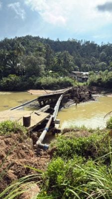 河水暴涨冲断旧桥水管  林明水供中断