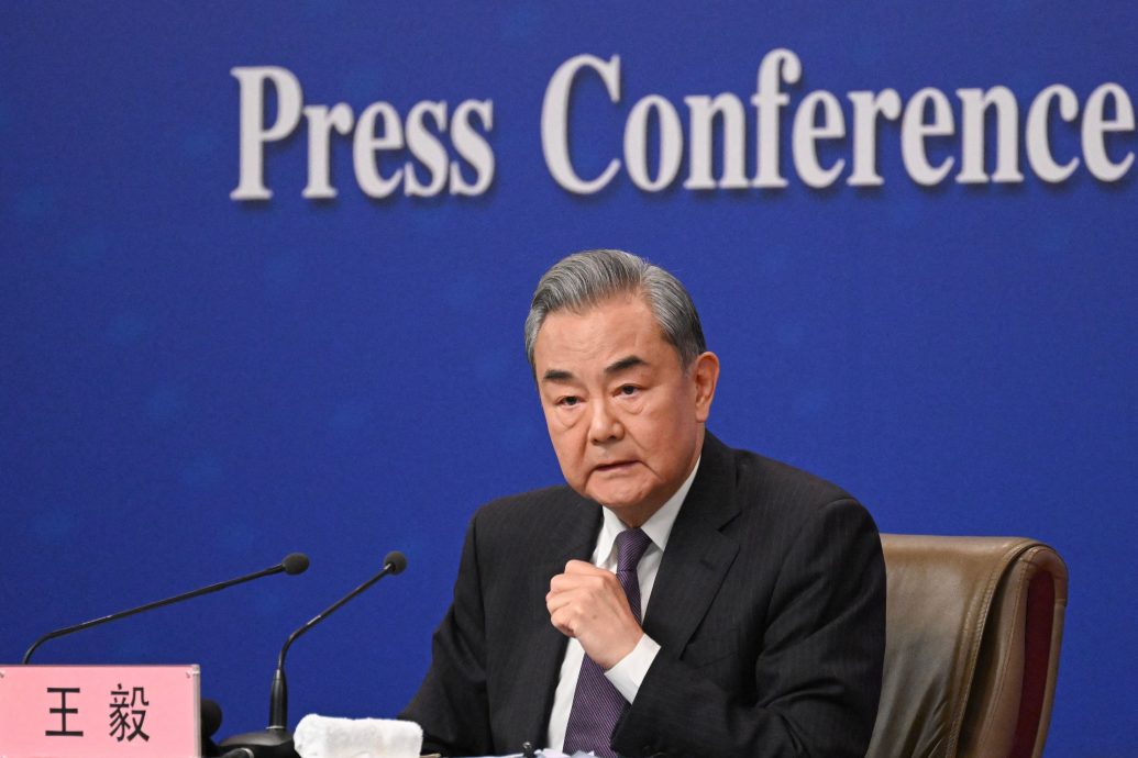 中国两会 王毅创纪录主持11次外长记者会