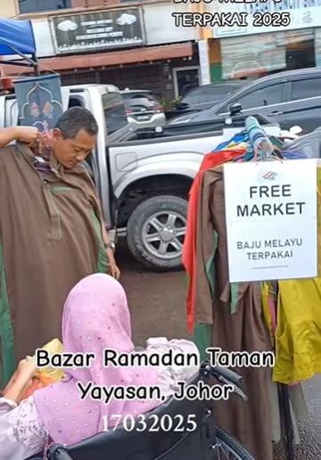 视频|男子设二手衣免费市场 让有需要的人任拿获赞