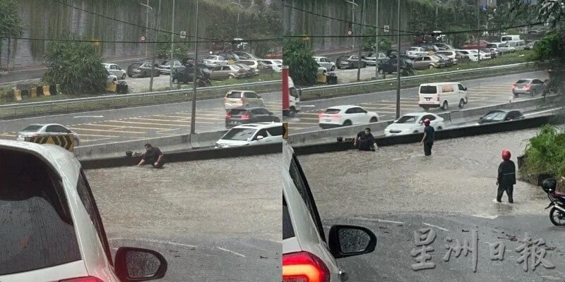 马路淹水轿车滞留难行 骑士淋雨徒手通沟获赞！ 