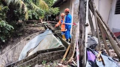 连夜雨致屋后山体滑坡．民防部队促居民警惕