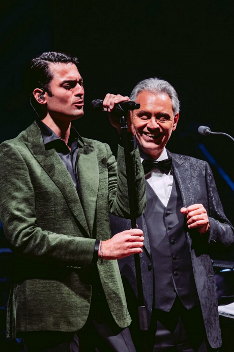 (Photo credit: Luca Rossetti) Andrea Bocelli shares the stage with his son Matteo Bocelli for a poignant duet, a heartwarming moment that touched the entire audience.