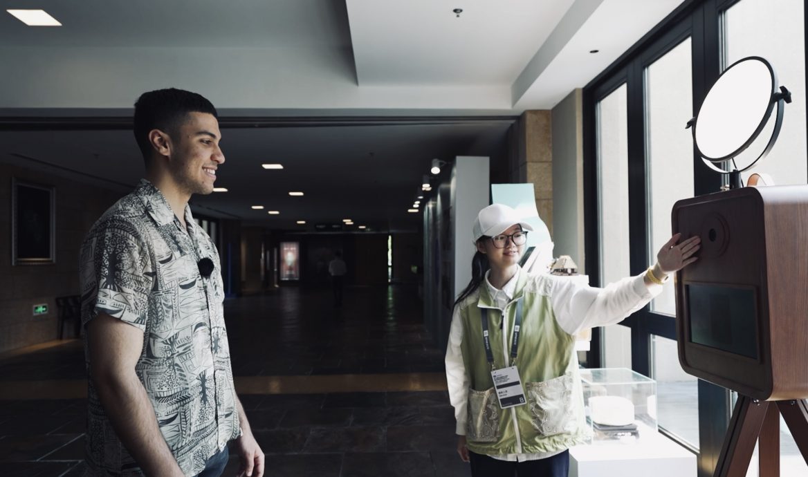 Moroccan youth Aymene engaged with the