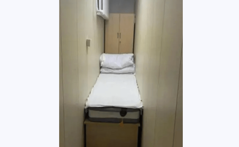 北京旅馆推无窗无冷气“棺材房” 50尺大墙壁夹睡床