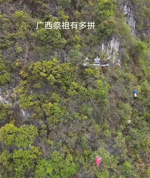 清明祭祖用上高科技 无人机吊运祭品上山